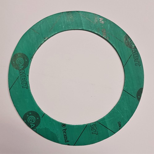 Uszczelka płaska wykonana z płyty AF-OIL Gambit o grubości 2 mm. Wykonanie wg DN 65 PN 10-16. Wersja przylga IBC. Odporna na woda morska pitna benzyna olej ropa diesel bio para wodna. Producent dystrybutor ORION GDYNIA